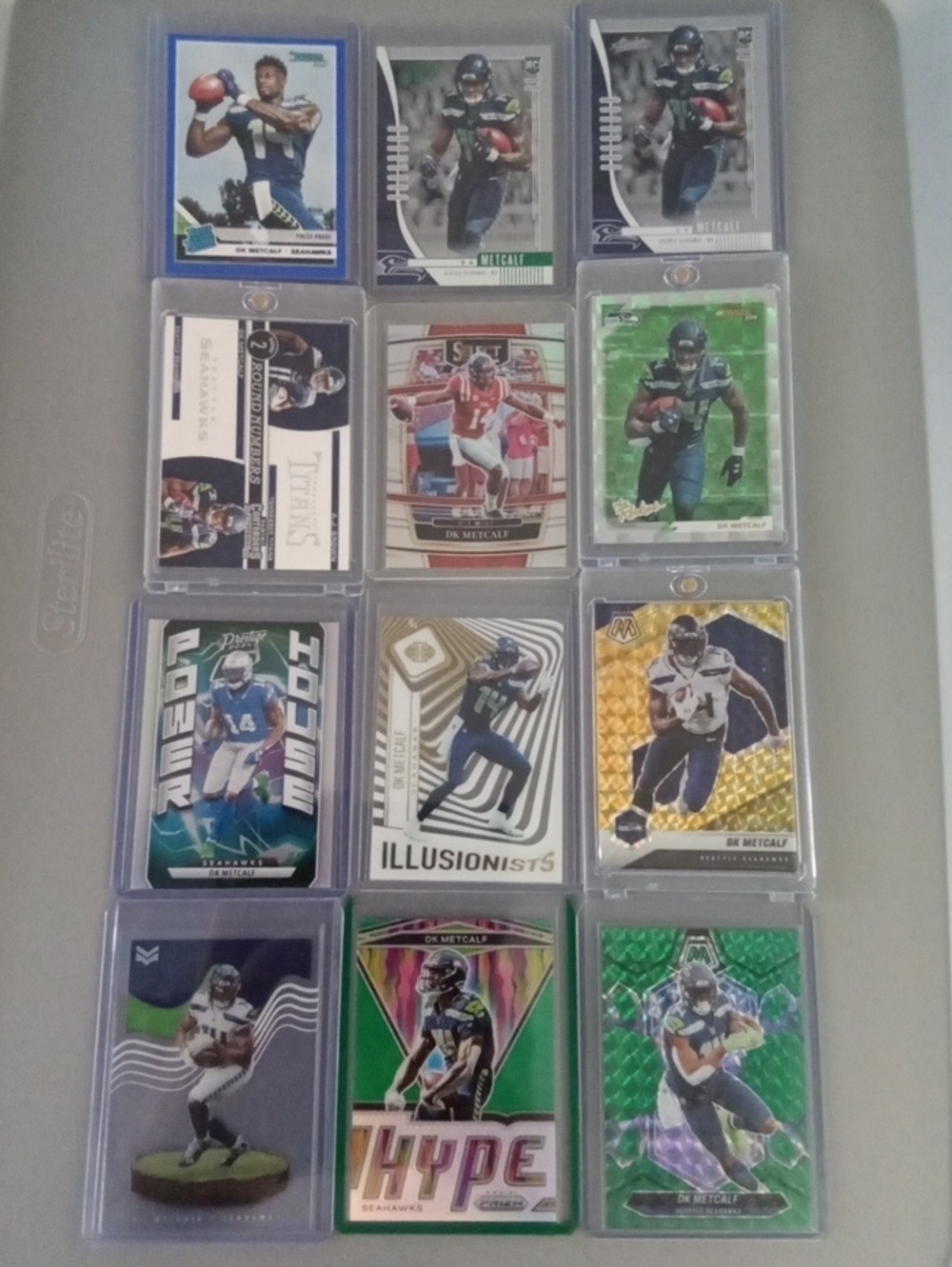 DK Metcalf Football Trading Card Lot - Green/Blue Highlights Rcs Included.